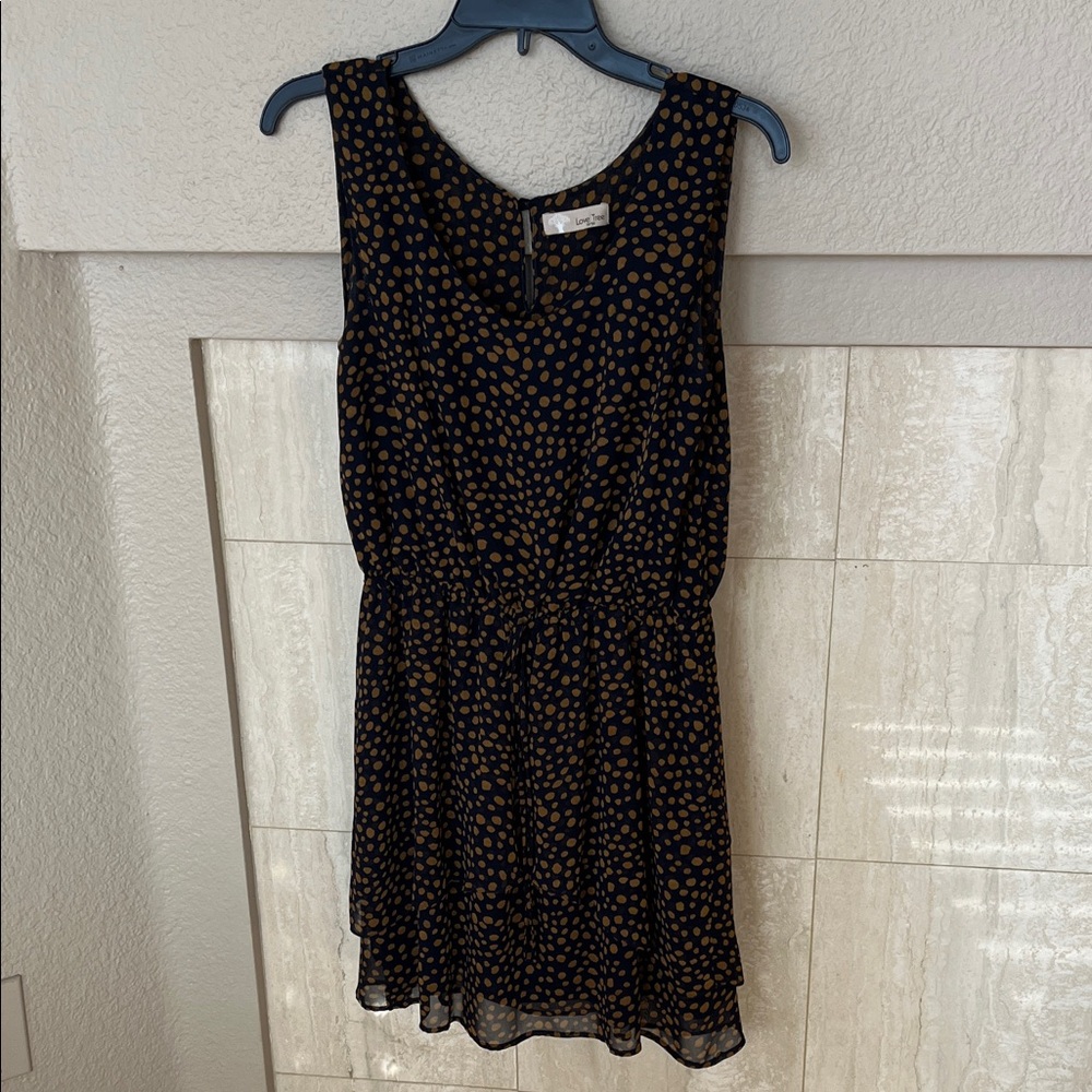 Elegant Black and Gold Polka Dot Dress